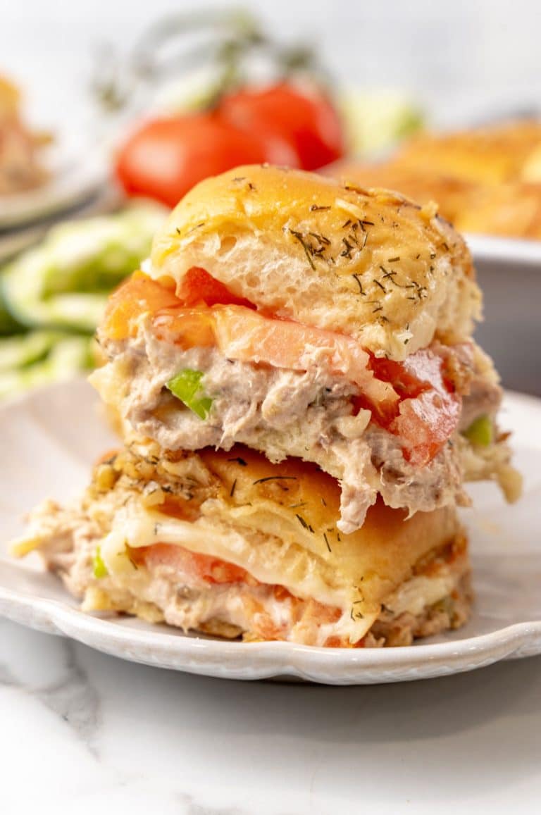 two tuna melt sliders on a small white plate