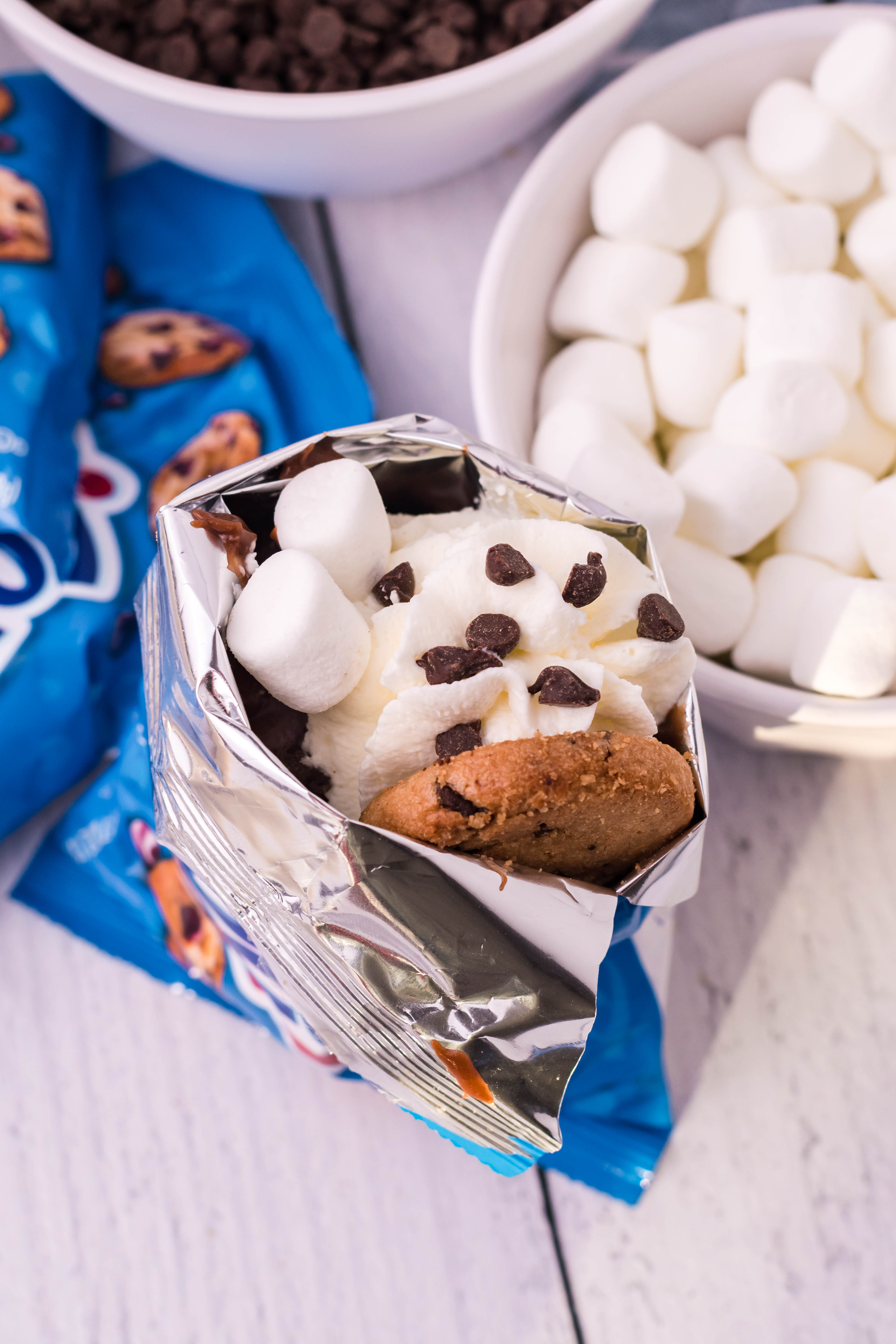 a cookie themed dessert in a bag with mini chips ahoy cookies