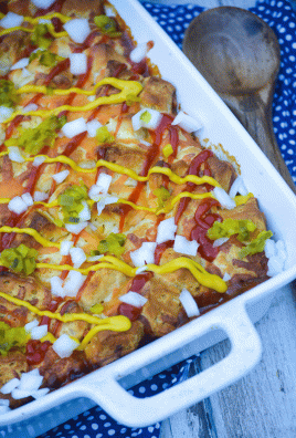 bubble up chili cheese dog bake in a white casserole dish
