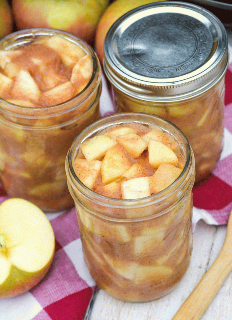 crockpot apple pie filling in glass mason jars