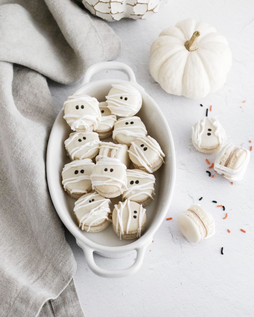 mummy macarons in a white oval serving dish