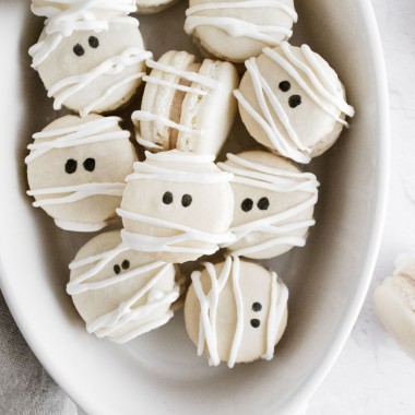 mummy macarons in a white oval serving dish