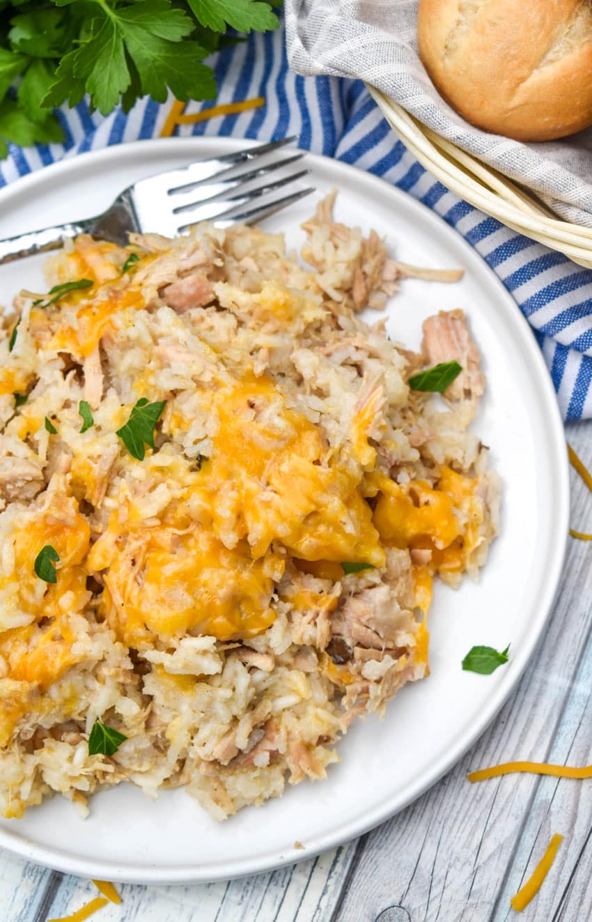 slow cooker pork and rice on a white dinner plate