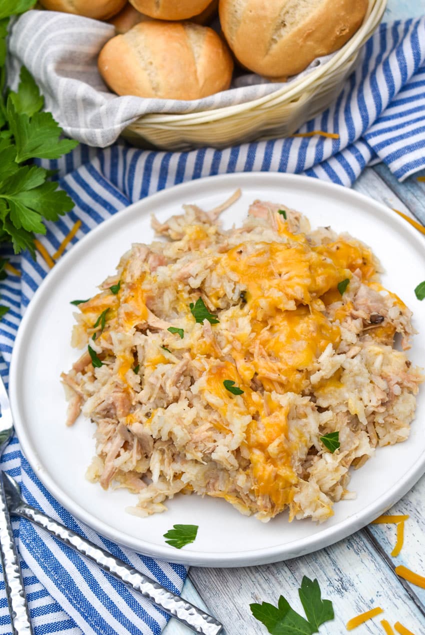 slow cooker pork and rice on a white dinner plate