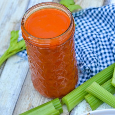 homemade buffalo wing sauce in a glass mason jar