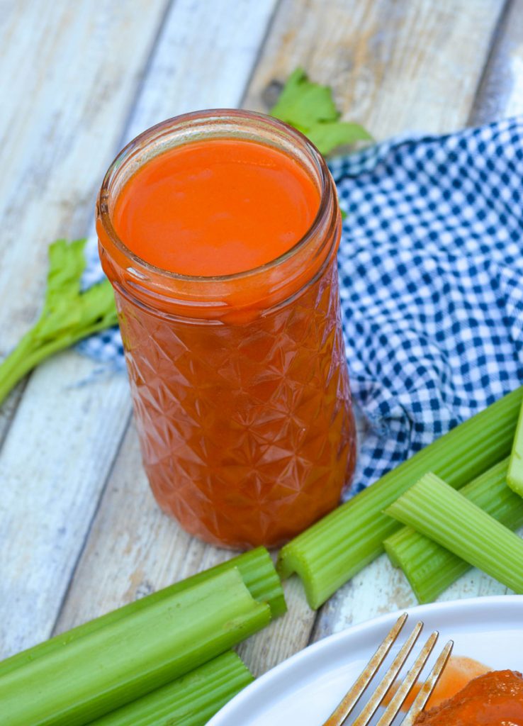 homemade buffalo wing sauce in a glass mason jar