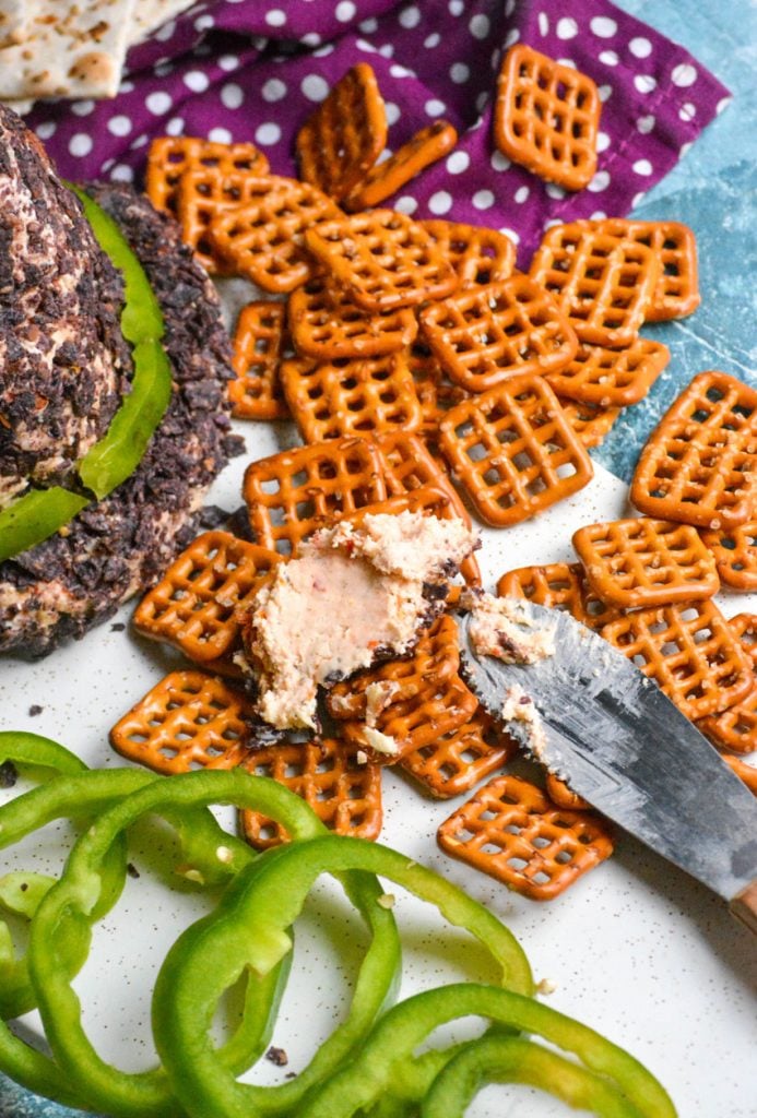 witch hat cheese ball spread on square pretzels