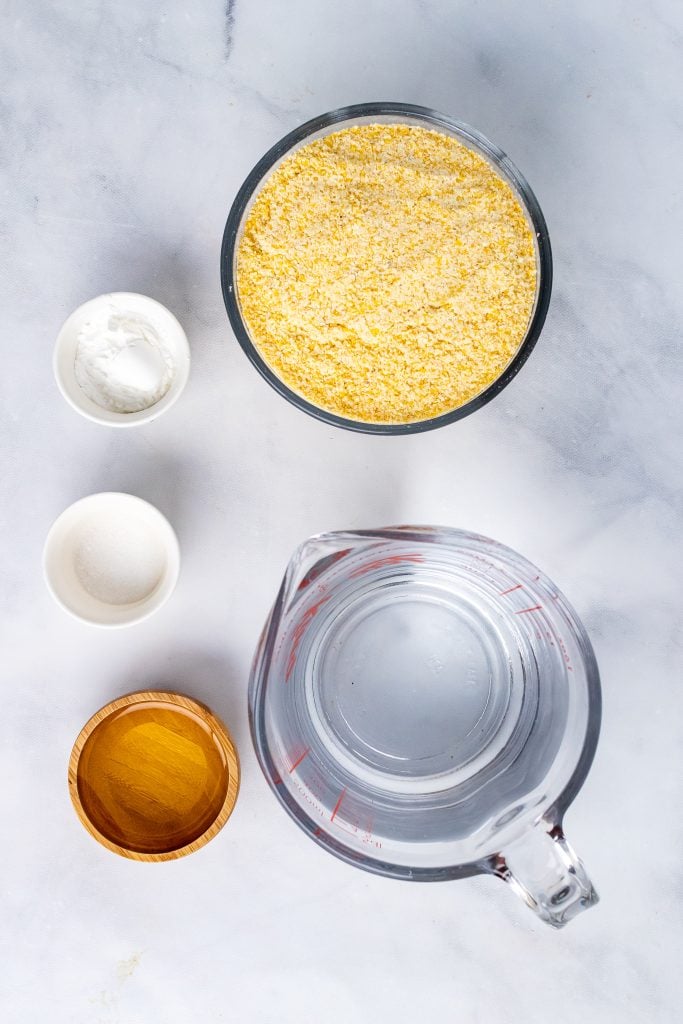 overhead image showing the measured ingredients needed to make a batch of hot water cornbread