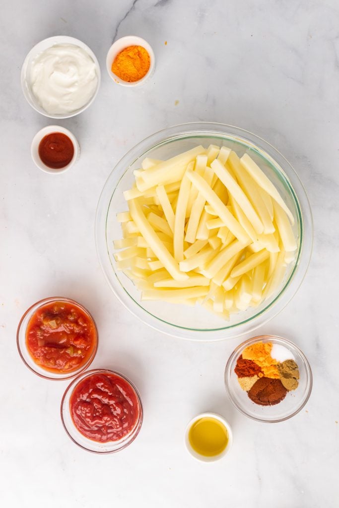 overhead images showing the measured ingredients needed to make nacho fries