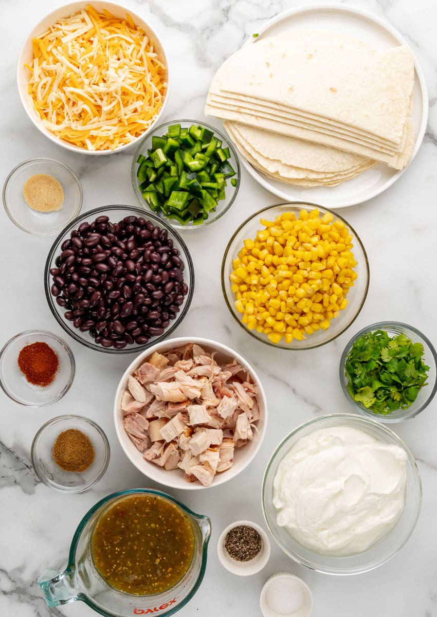 an overhead image showing the measured ingredients needed to make a homemade Tex Mex lasagna