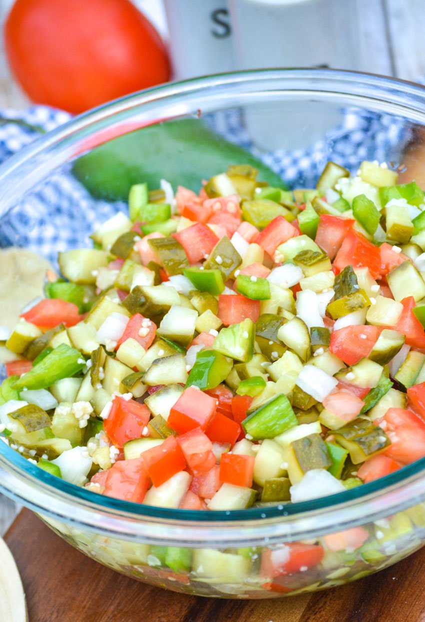 a fresh batch of pickle de gallo in a glass mixing bowl