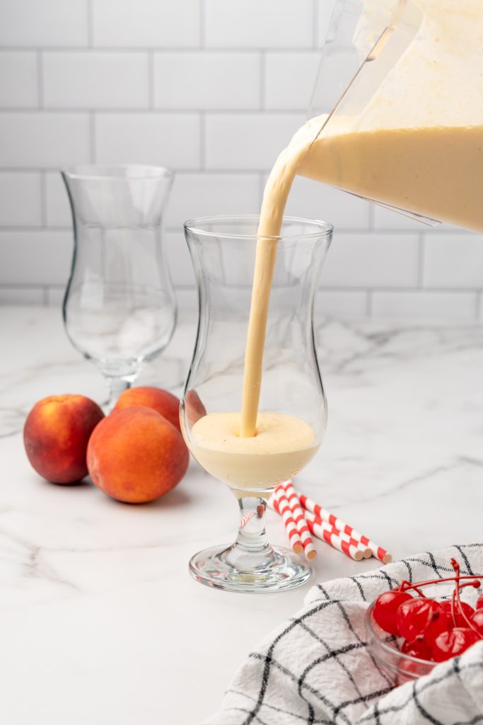 copycat chick fil a peach being poured in a large glass