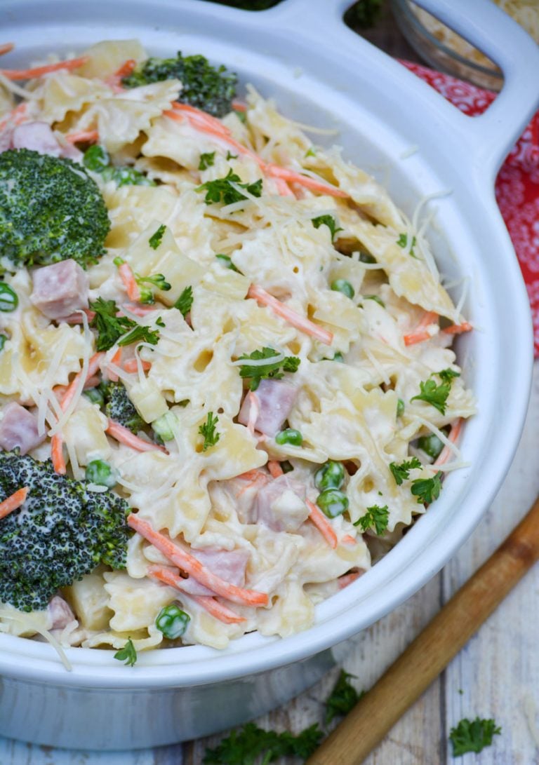 chicken cordon bleu pasta salad in a white bowl