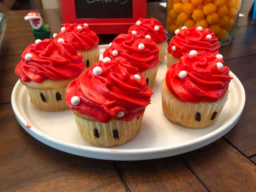 super mario toad stool cupcakes on a white plate