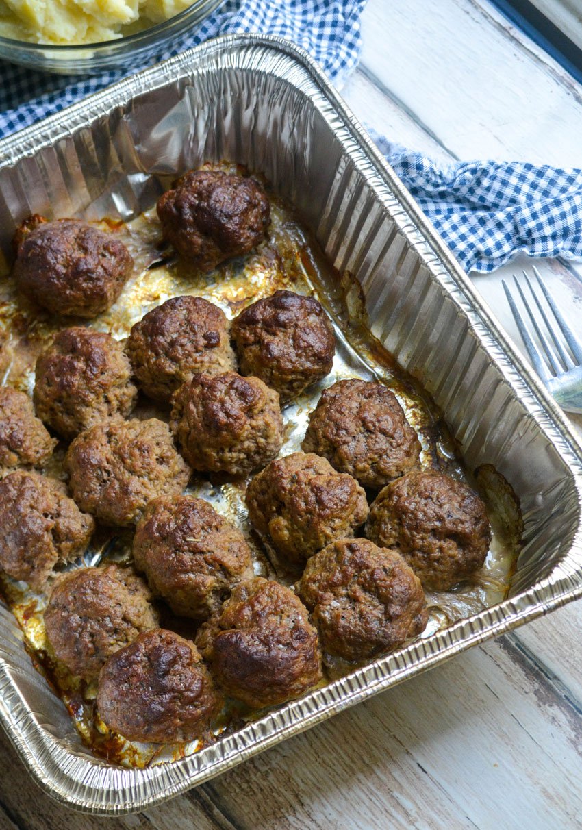 smoked meatballs in a disposable aluminum tray