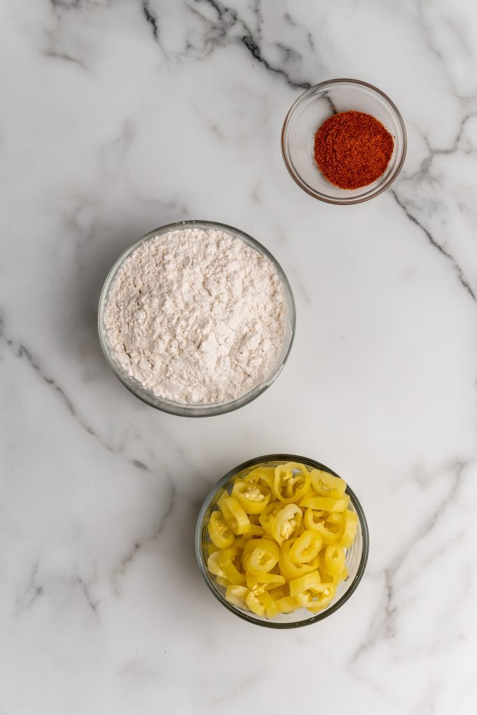 overhead image showing the measured ingredients needed to make a batch of fried banana peppers