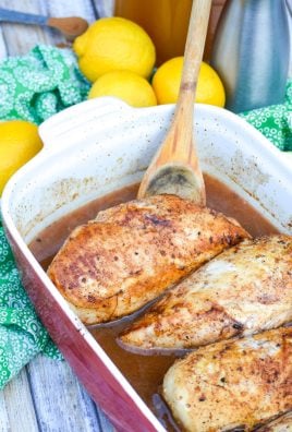a wooden spoon resting in a casserole dish with pieces of little house on the prairie cinnamon chicken breasts