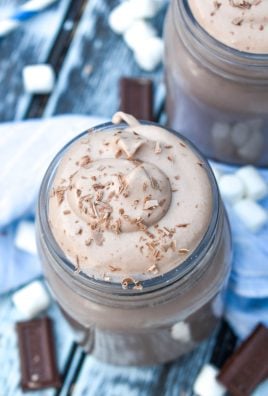 whipped hot chocolate in a glass jar topped with shaved chocolate