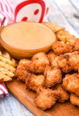 copycat chick fil a nuggets on a wooden cutting board