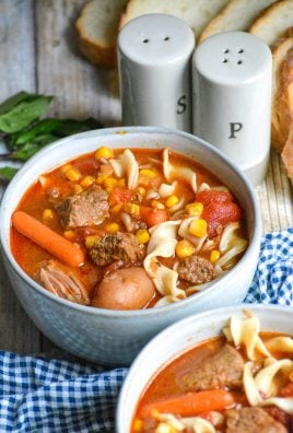 Instant pot beef noodle soup in small gray bowls