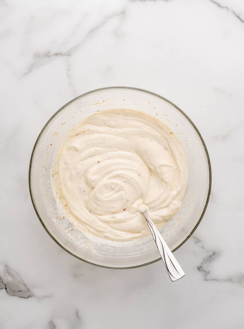 easy mexican white ranch dip in a glass mixing bowl