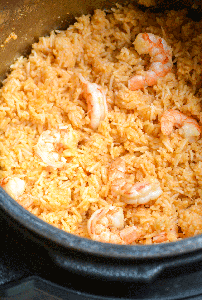 fluffy shrimp and rice with sweet and sour sauce in an instant pot