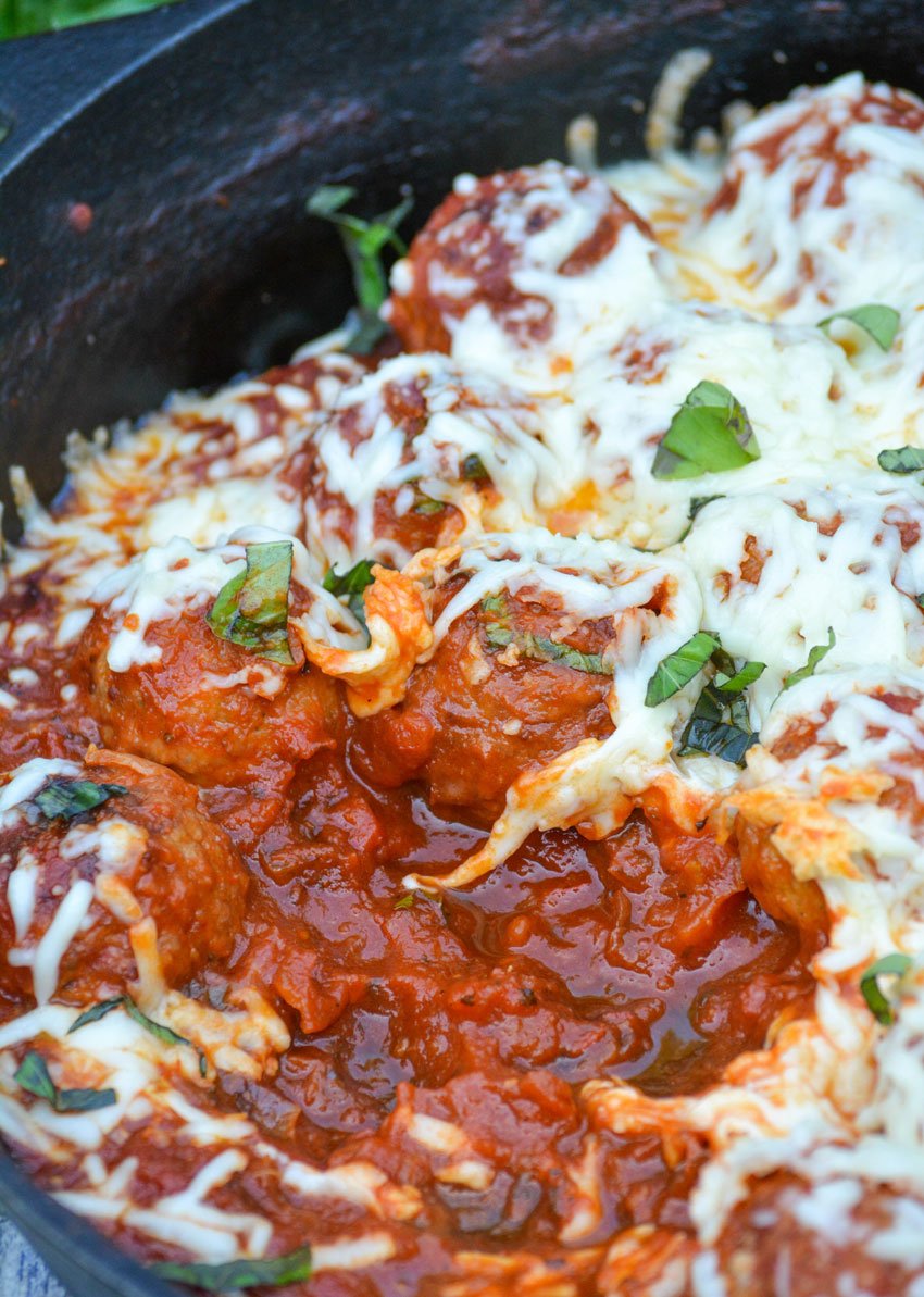 a saucy meatball parmesan skillet in cast iron