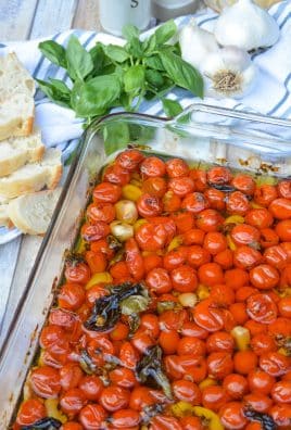 cherry tomato confit in a glass baking dish