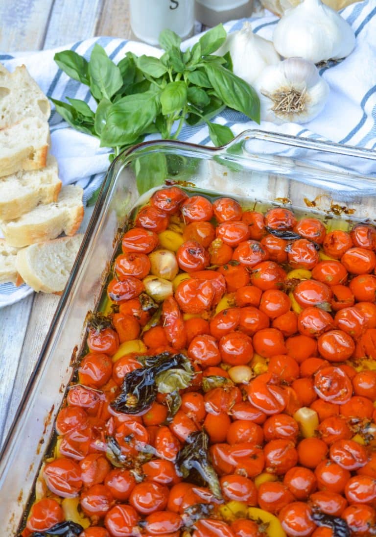 cherry tomato confit in a glass baking dish