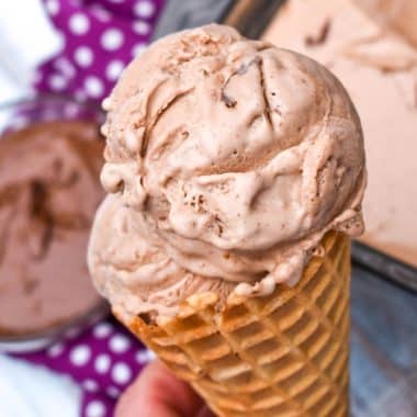 scoops of four ingredient nutella ice cream in a waffle cone