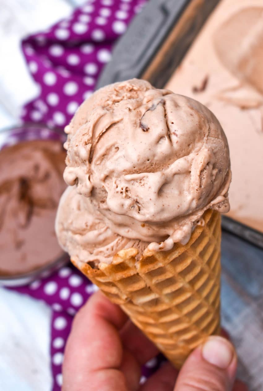 scoops of four ingredient nutella ice cream in a waffle cone
