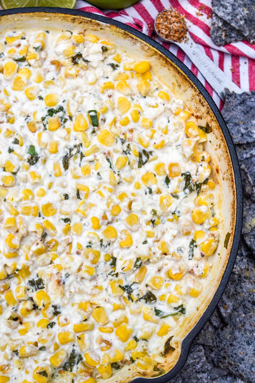 smoked street corn dip in a cast iron skillet