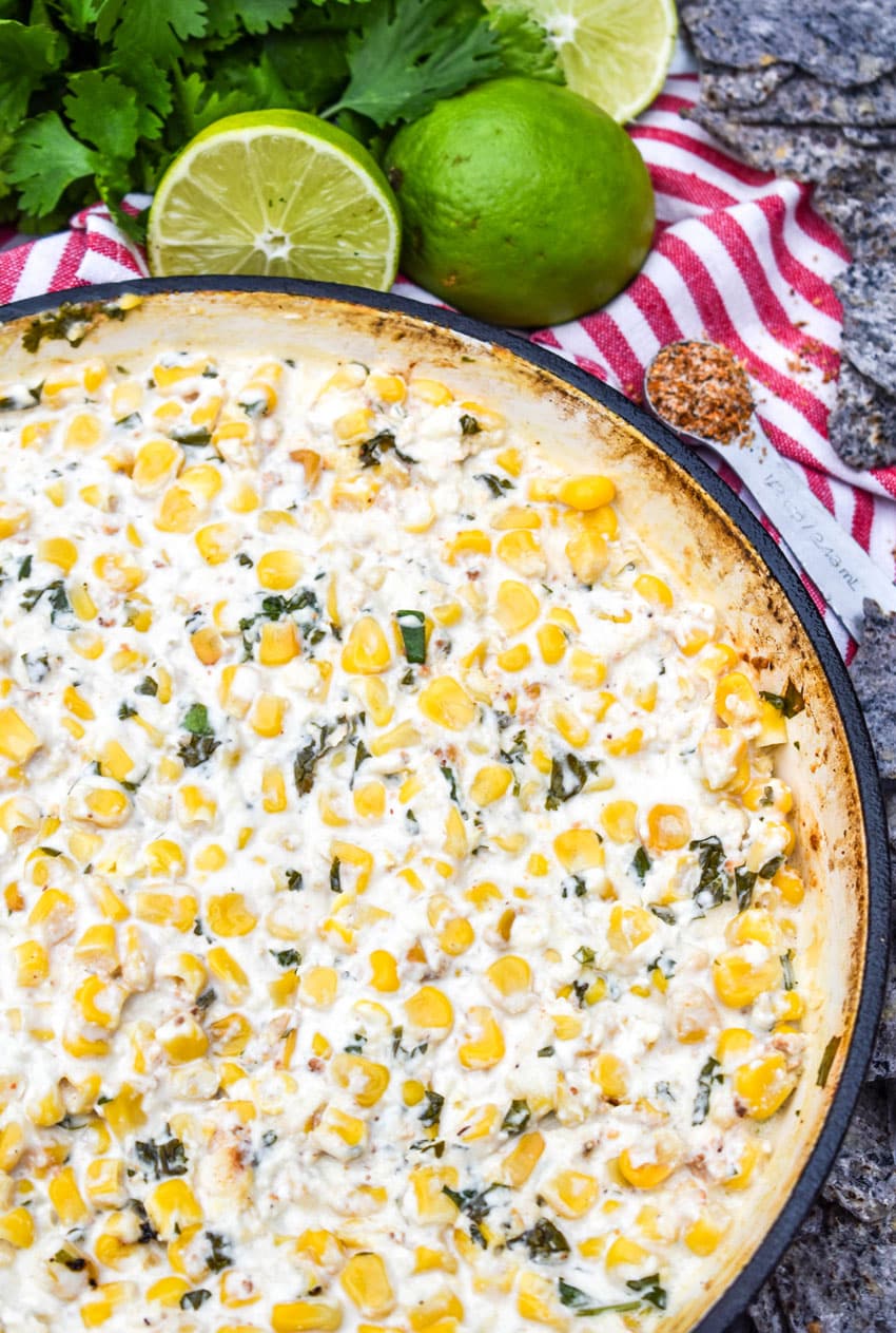 smoked street corn dip in a cast iron skillet
