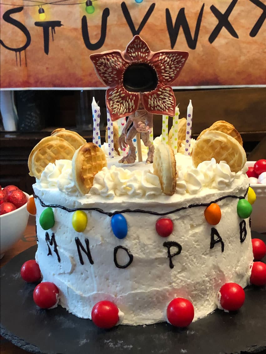 homemade stranger things birthday cake topped with mini eggo waffles