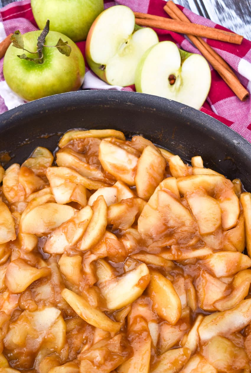 cracker barrel fried apples in a large black skillet