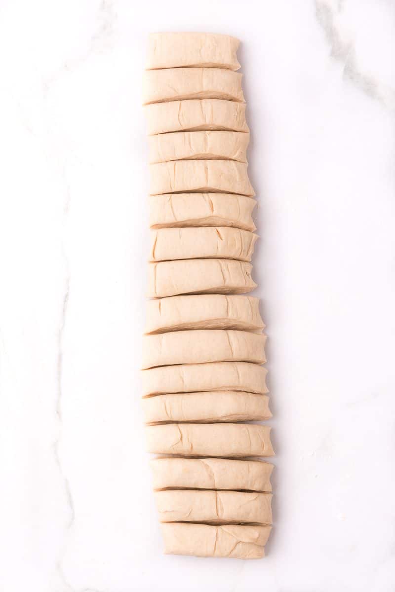 a rectangle of dough cut into 18 strips