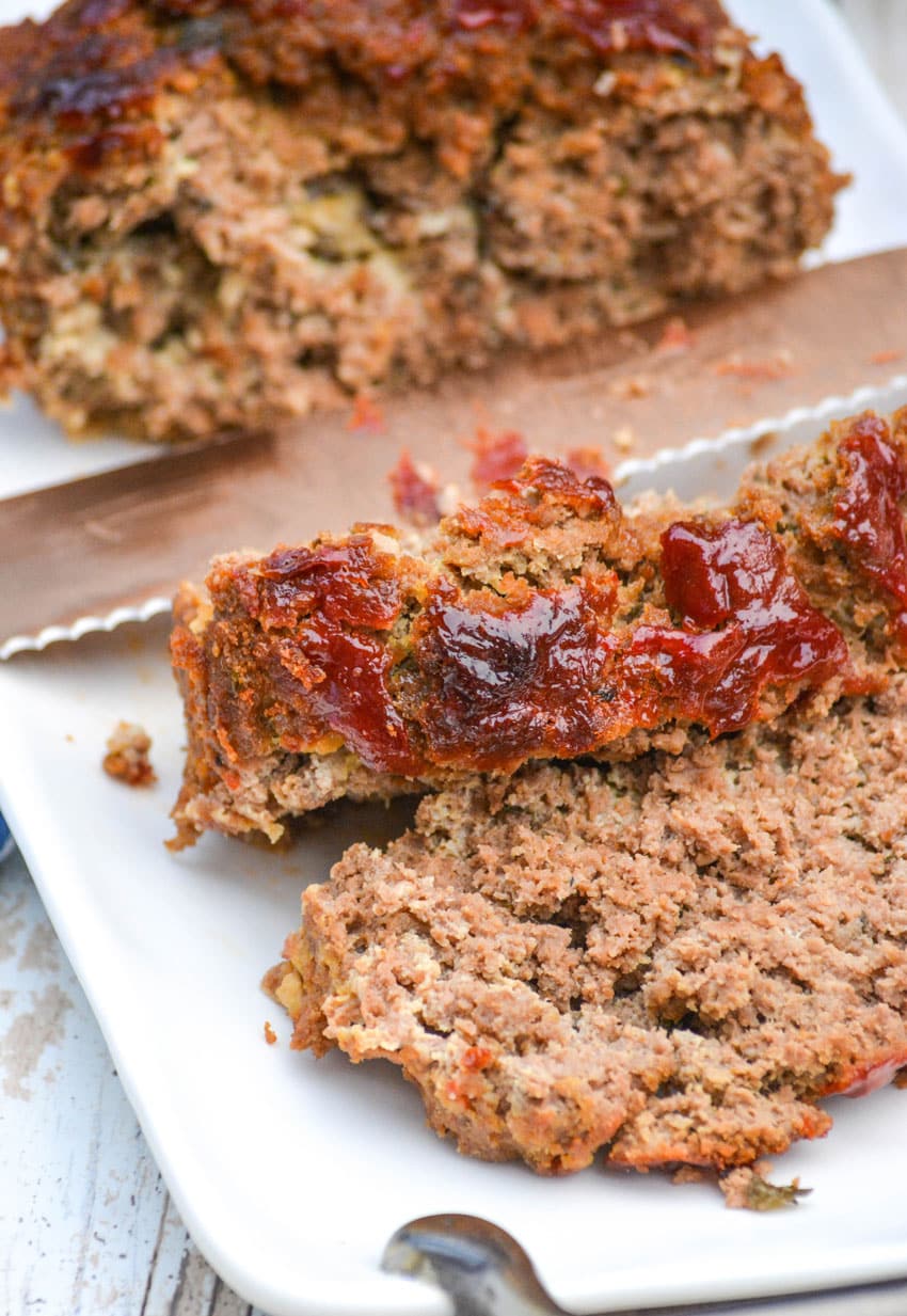 slices of Grandma's classic meatloaf recipe on a white serving platter