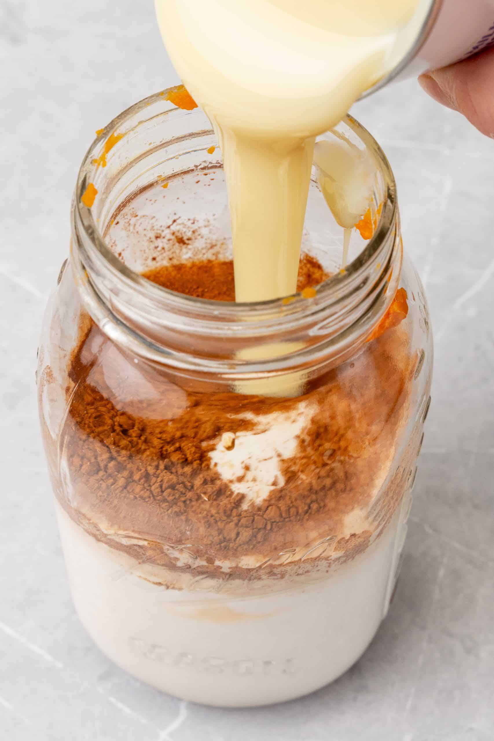 homemade pumpkin spice creamer ingredients in a large glass jar