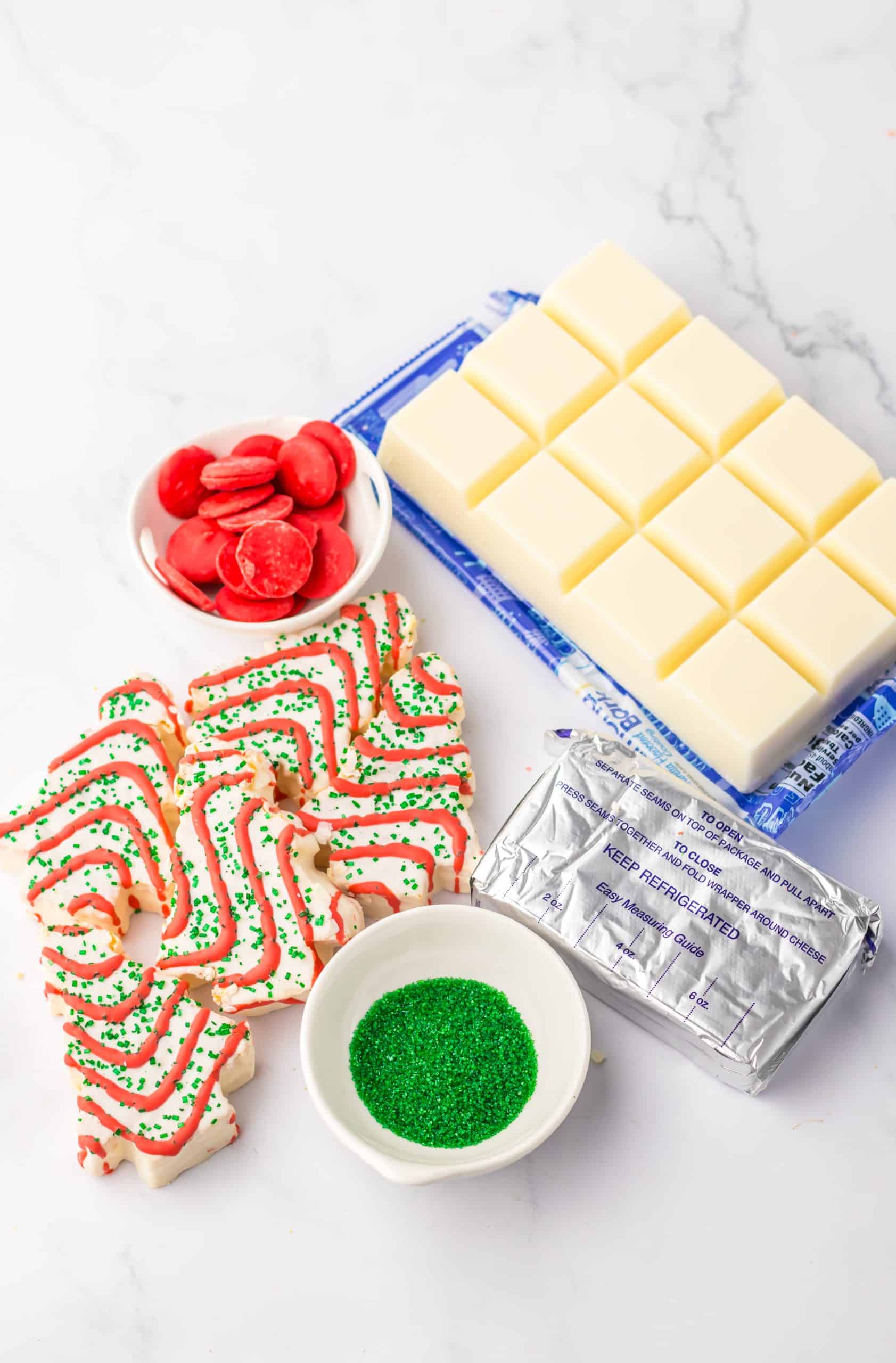 an overhead image showing the measured ingredients needed to make a batch of little debbie christmas tree cake truffles