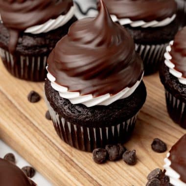 hi hat cupcakes on a wooden cutting board