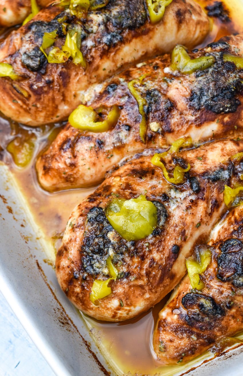 baked mississippi chicken in a large white baking dish