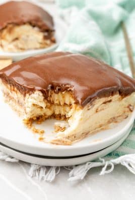 a slice of an easy pan eclair recipe on a small white dessert plate