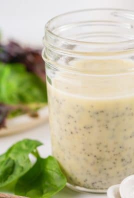 creamy poppyseed dressing in a small glass mason jar