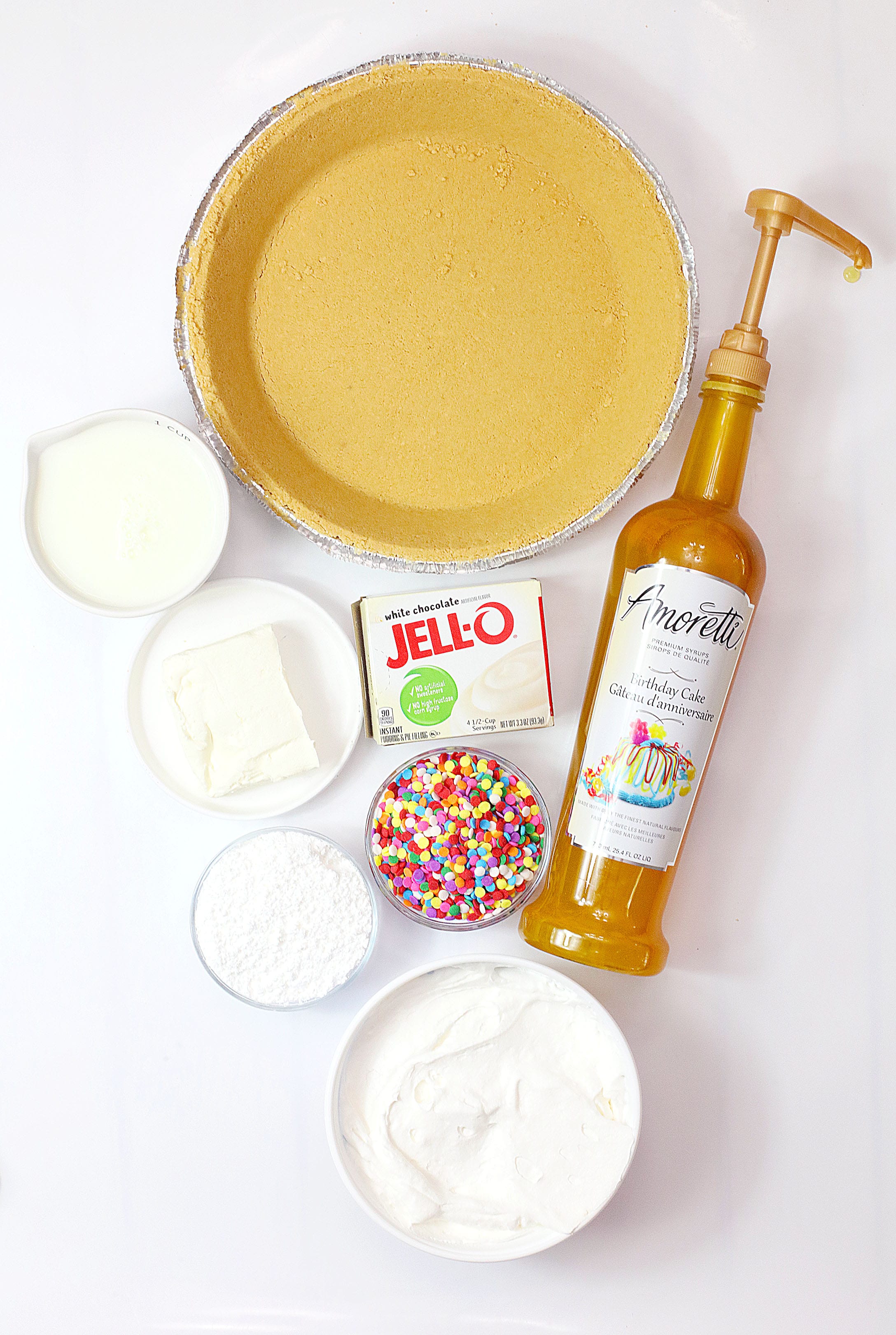 an overhead image showing the ingredients needed to make a no bake cake batter pie