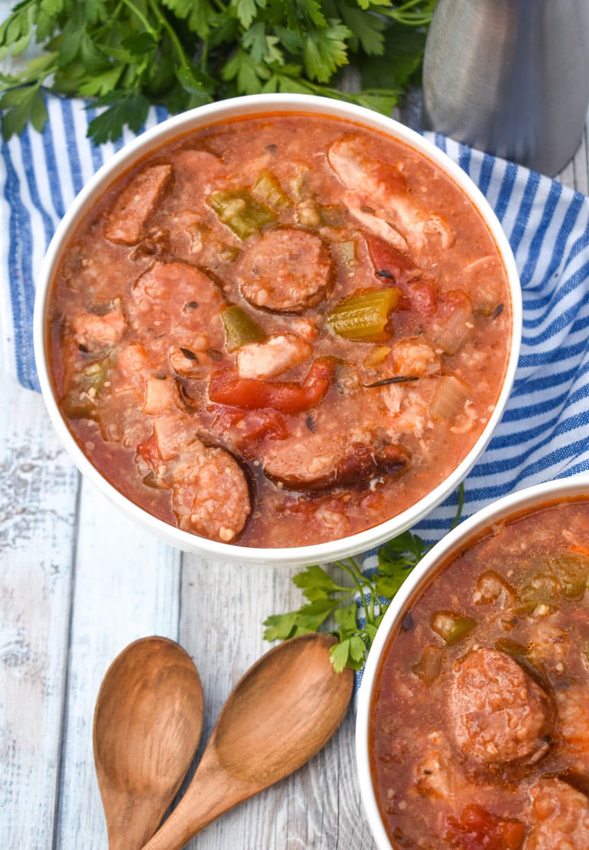 slow cooker chicken gumbo in two white bowls