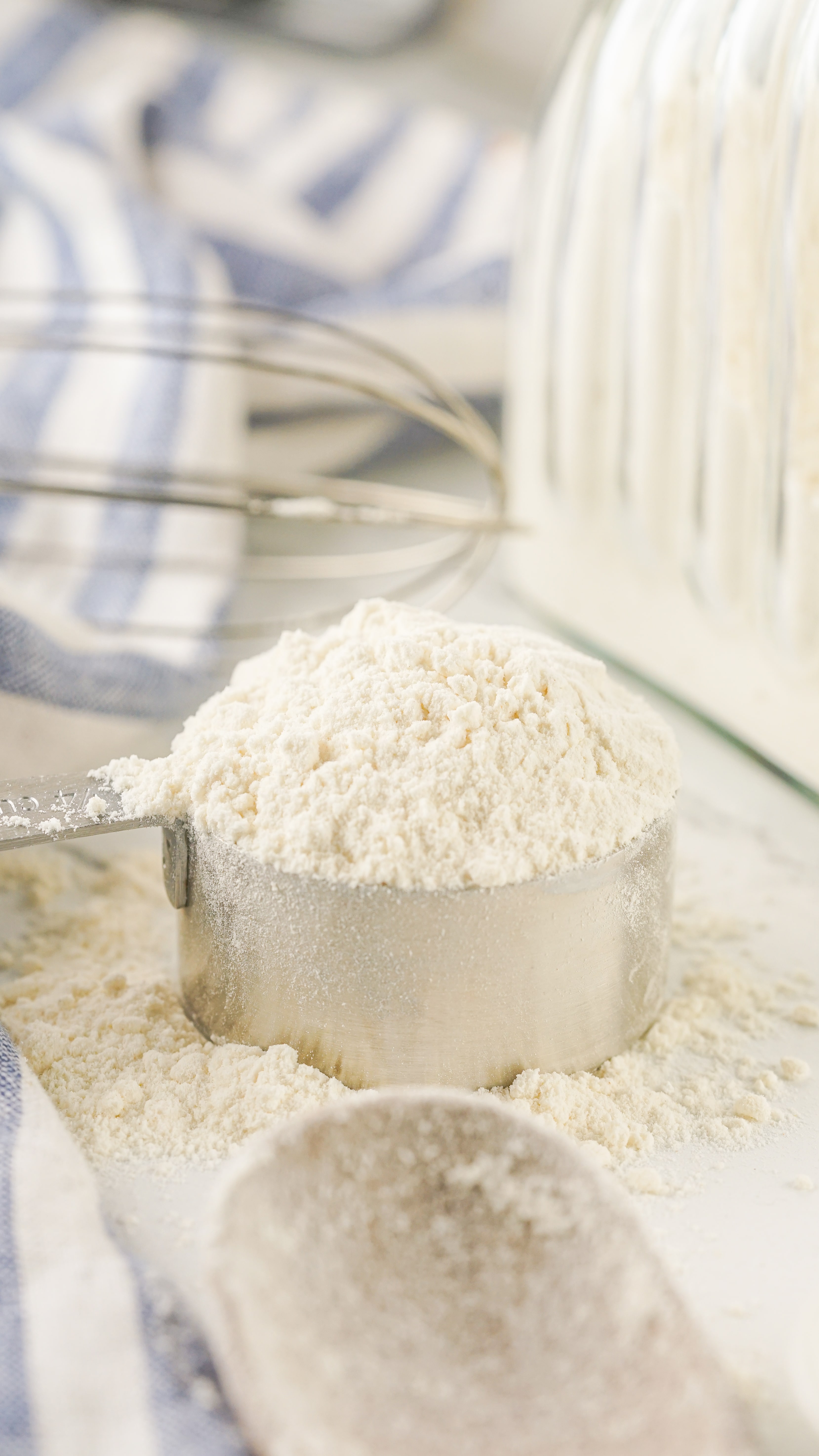 homemade bisquick recipe in a measuring cup on a white counter top