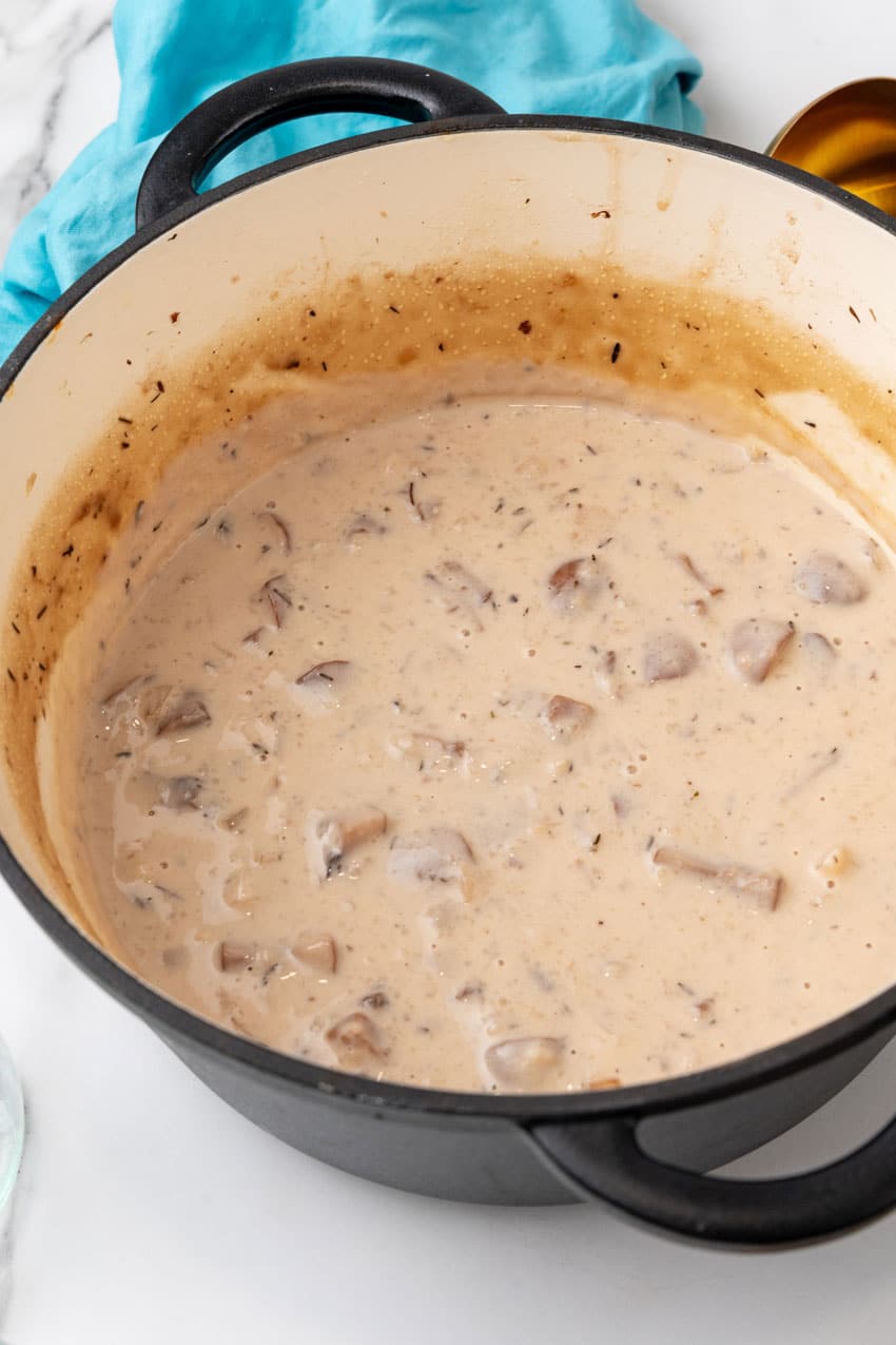 homemade cream of mushroom soup in a large dutch oven