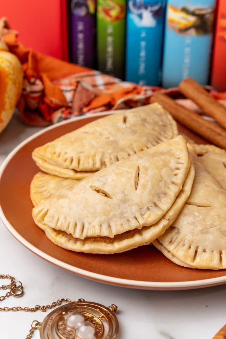 harry potter pumpkin pasties piled on an orange plate