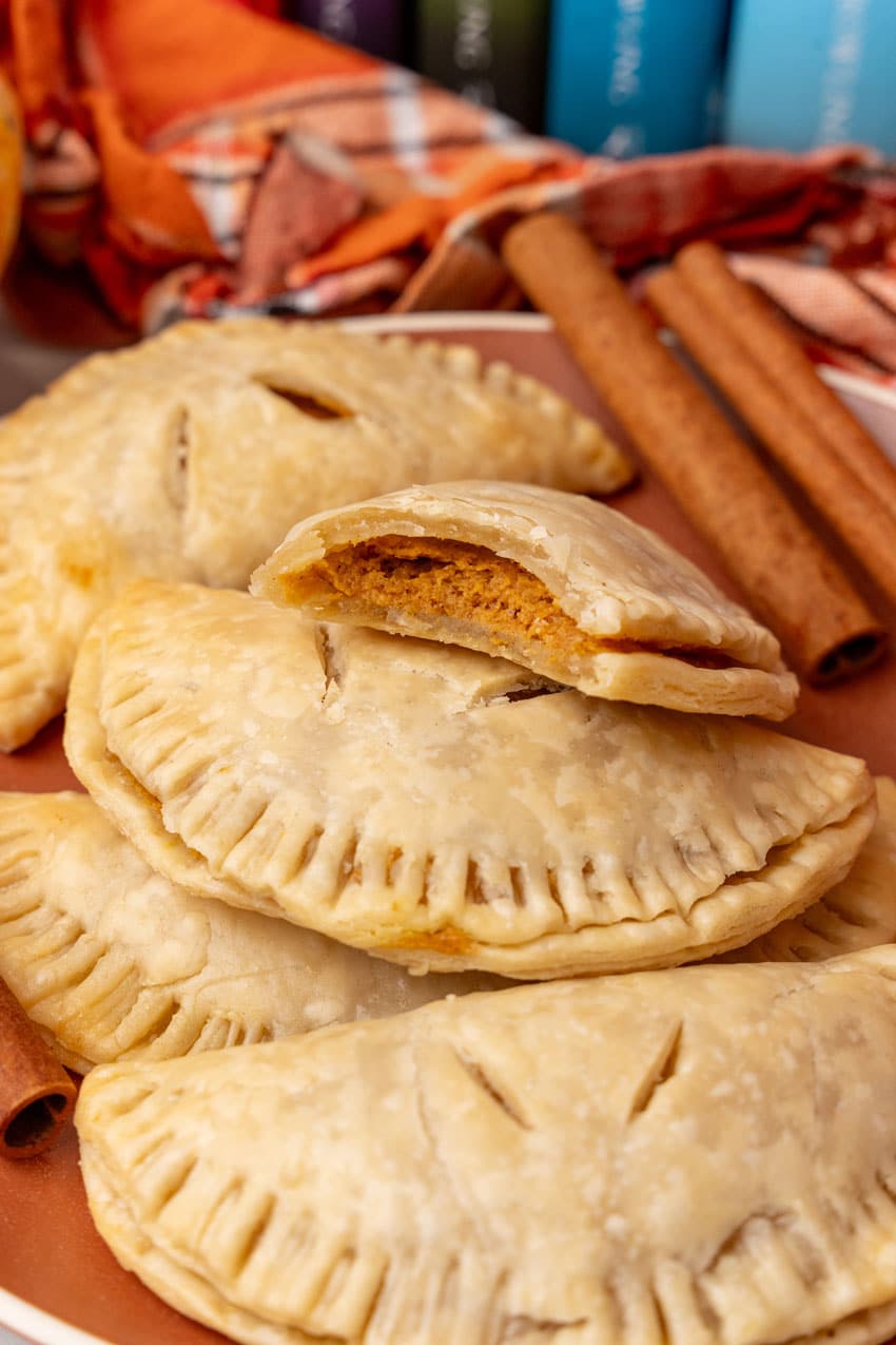 harry potter pumpkin pasties piled on an orange plate