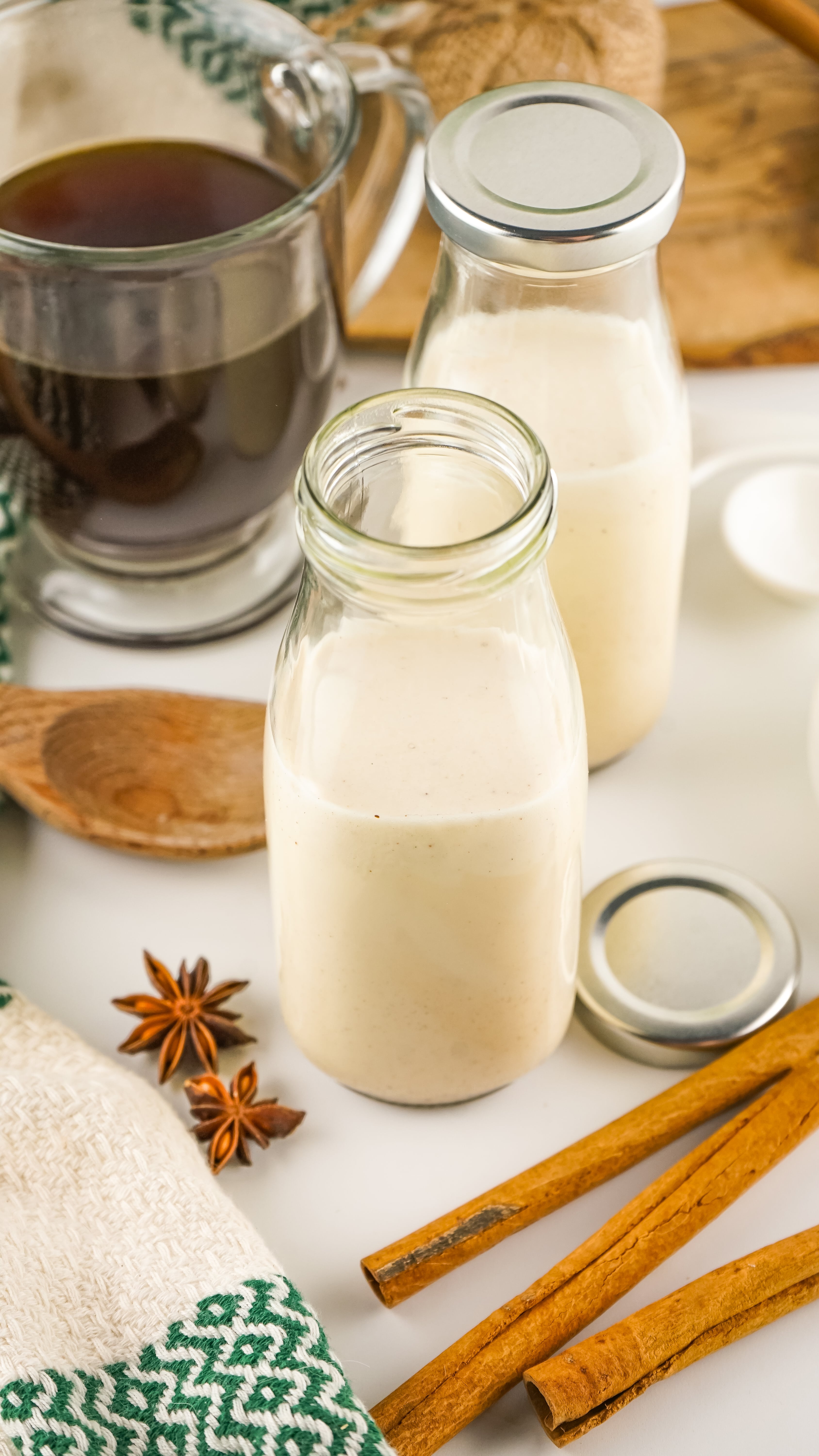 homemade eggnog coffee creamer in a small glass milk jar